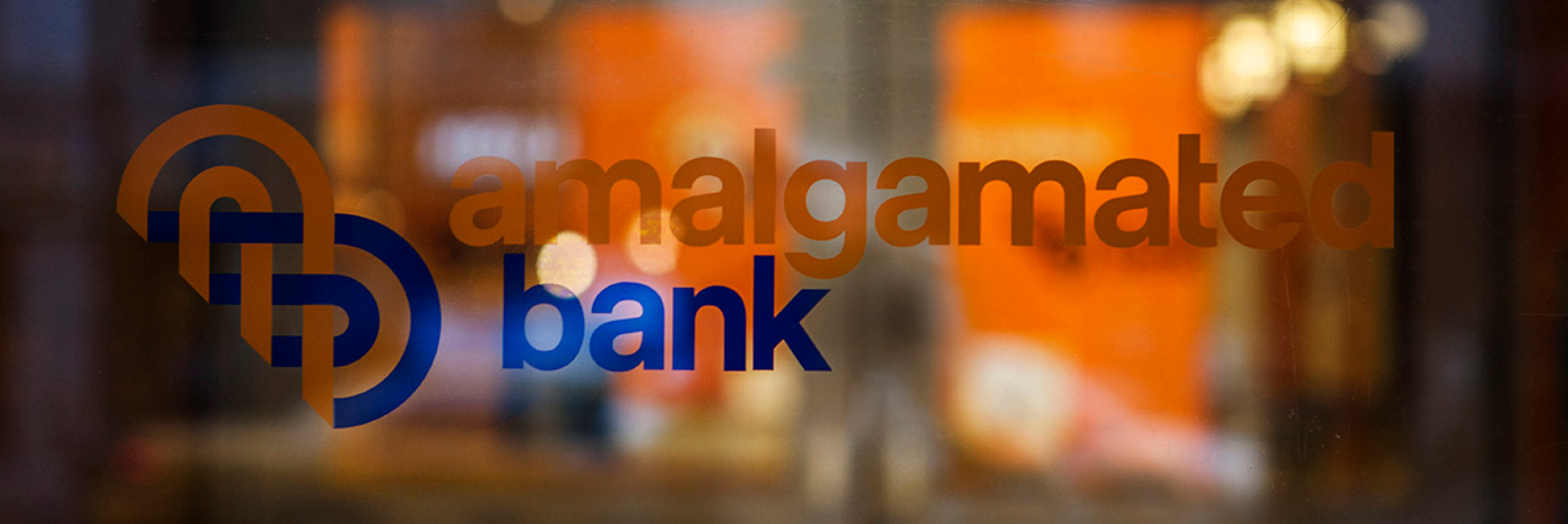 Amalgamated Bank logo on glass