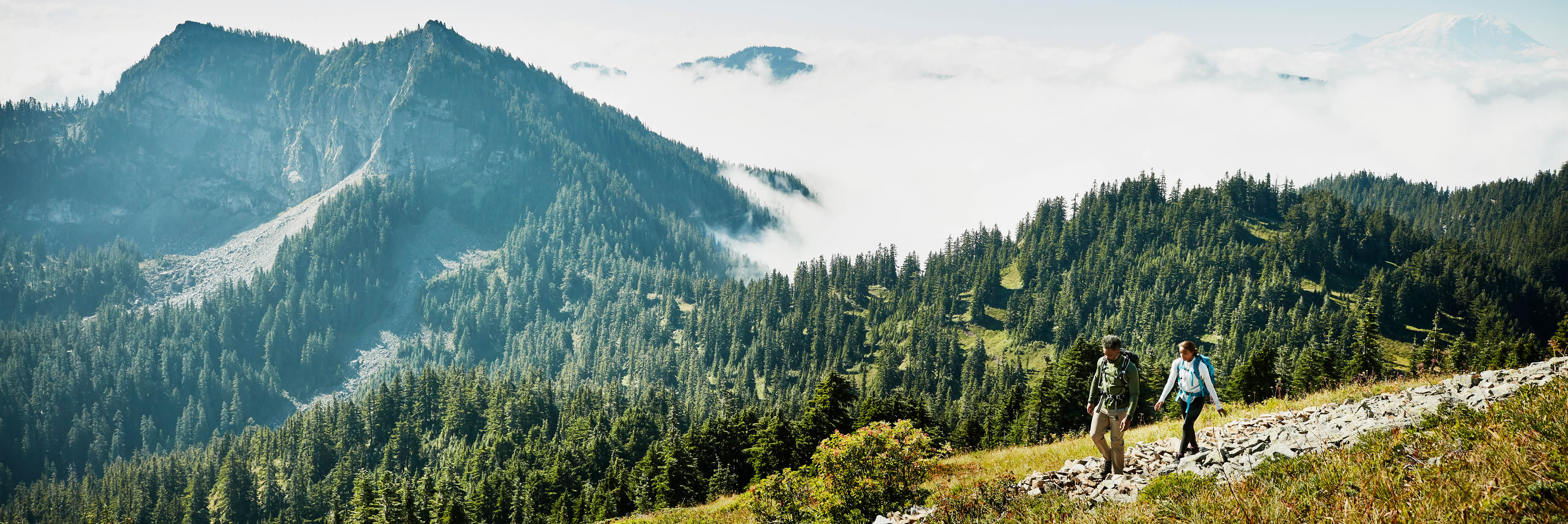 a man and woman hiking 