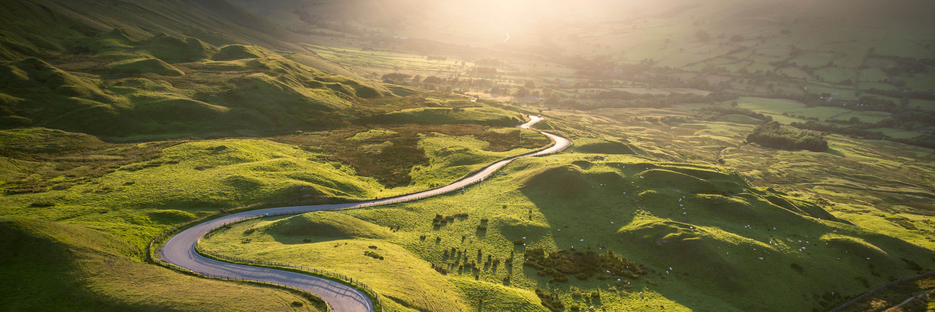 Green valley with a road