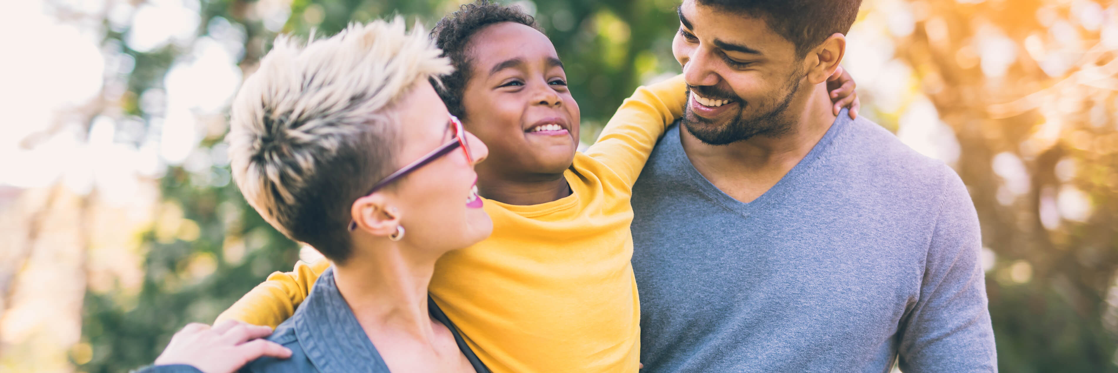 Couple smiling with son