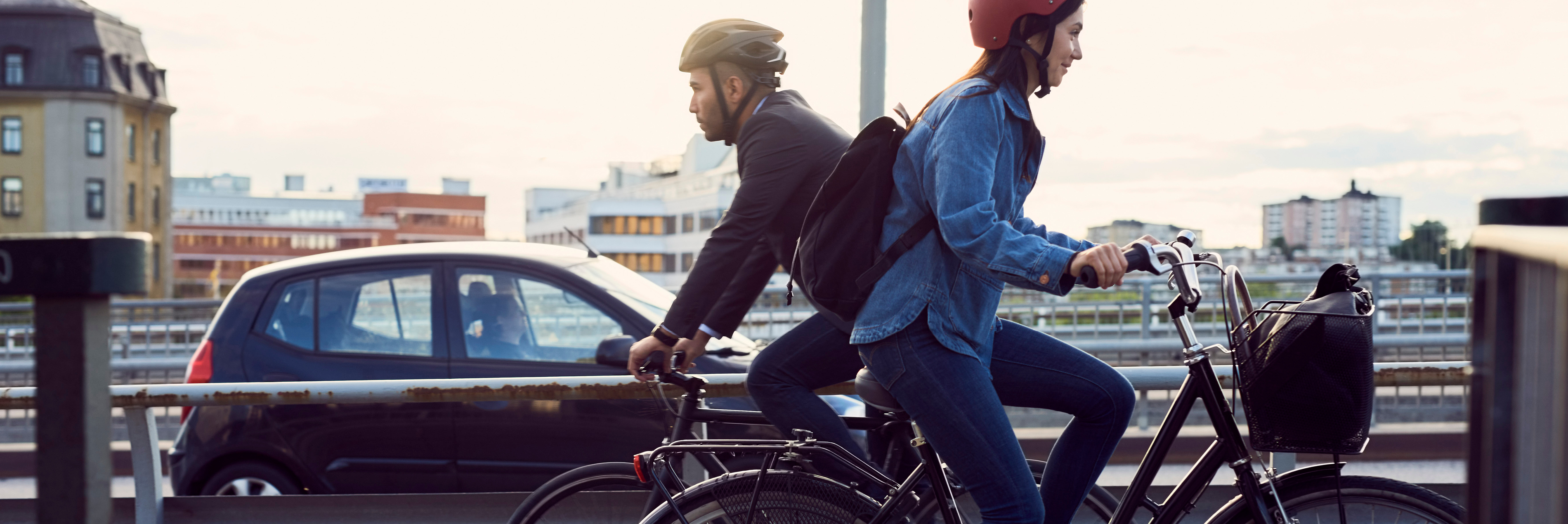 man and woman riding bikes