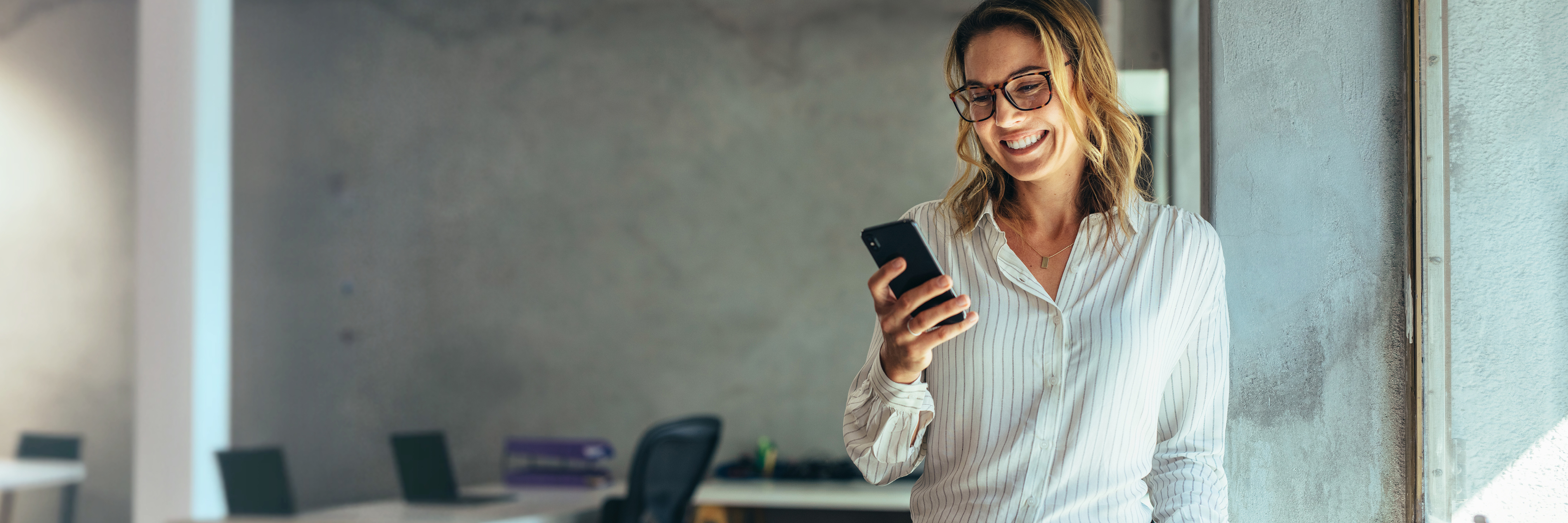 Woman holding a mobile phone