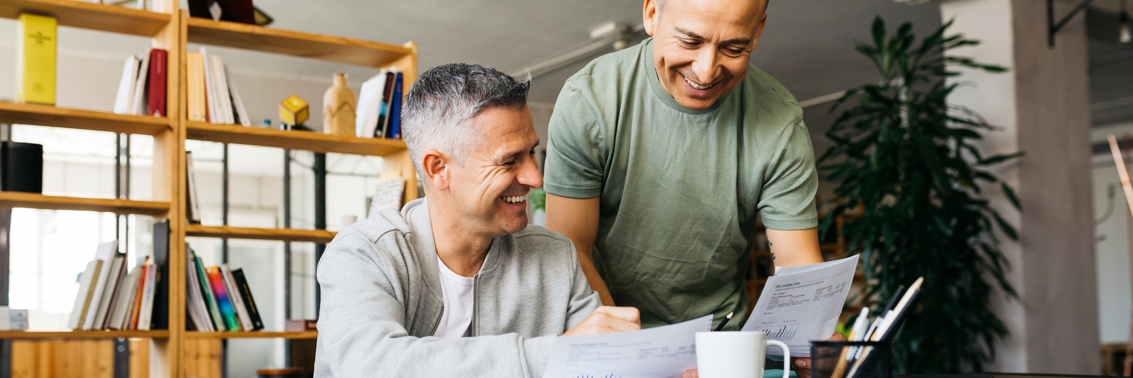 Two men looking at a document