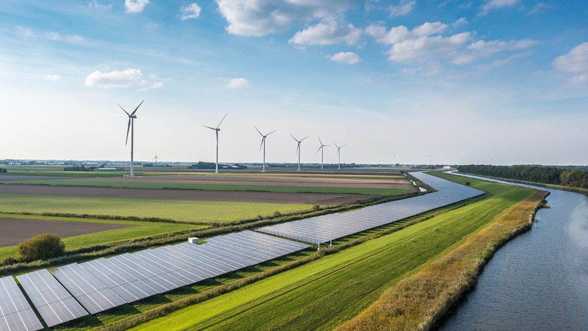 Aerial image of wind turbines and solar panels