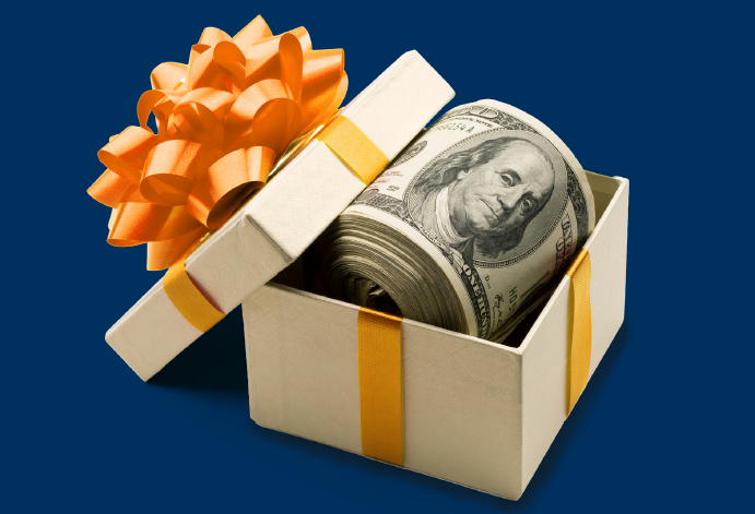 A small gift box containing cash notes