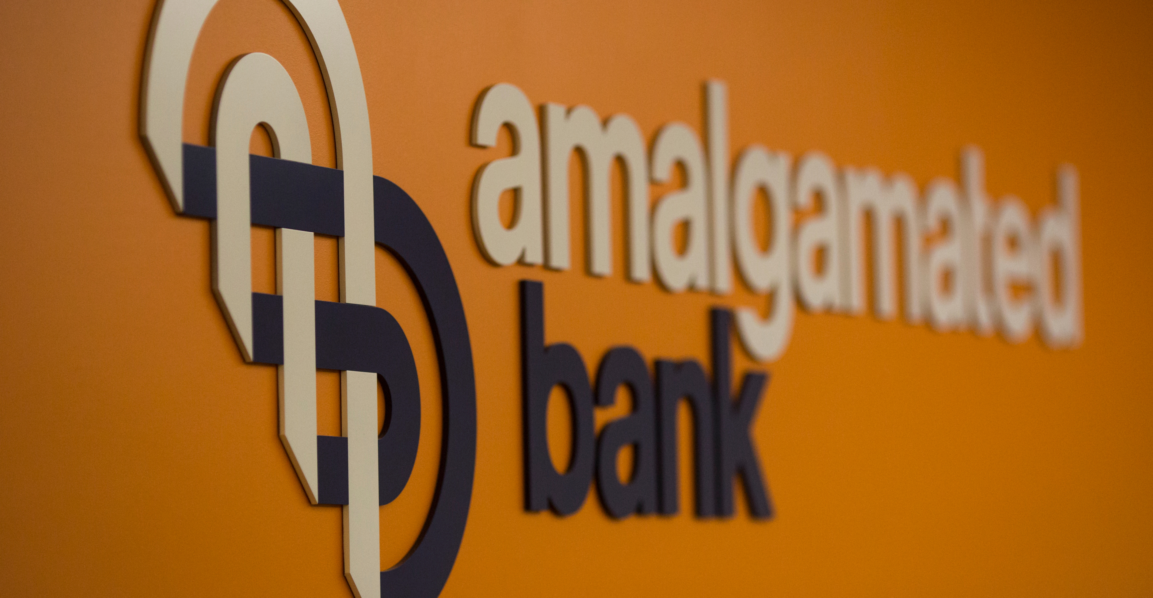 Amalgamated bank logo on wall