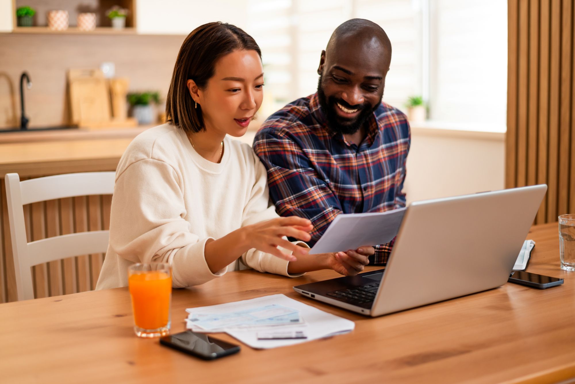 Couple in front of laptop digital banking